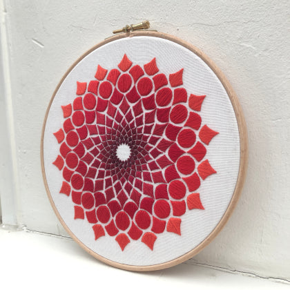 Kaleidoscope OG red (kit example) dark to light finished embroidery hoop