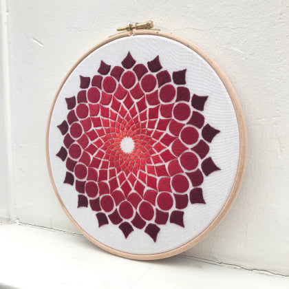 Kaleidoscope OG red (kit example) light to dark finished embroidery hoop