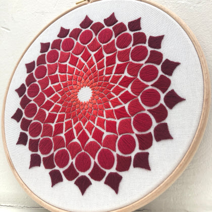 Kaleidoscope OG red (kit example) light to dark finished embroidery hoop
