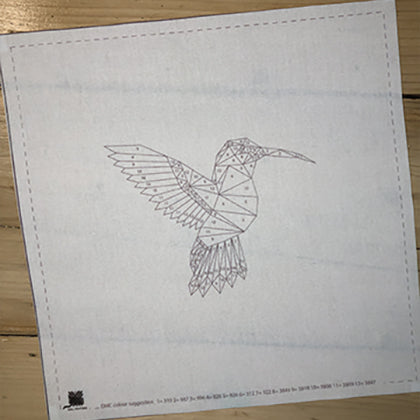 Hummingbird printed pattern on fabric