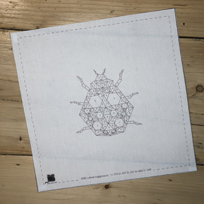 Ladybug printed pattern on fabric